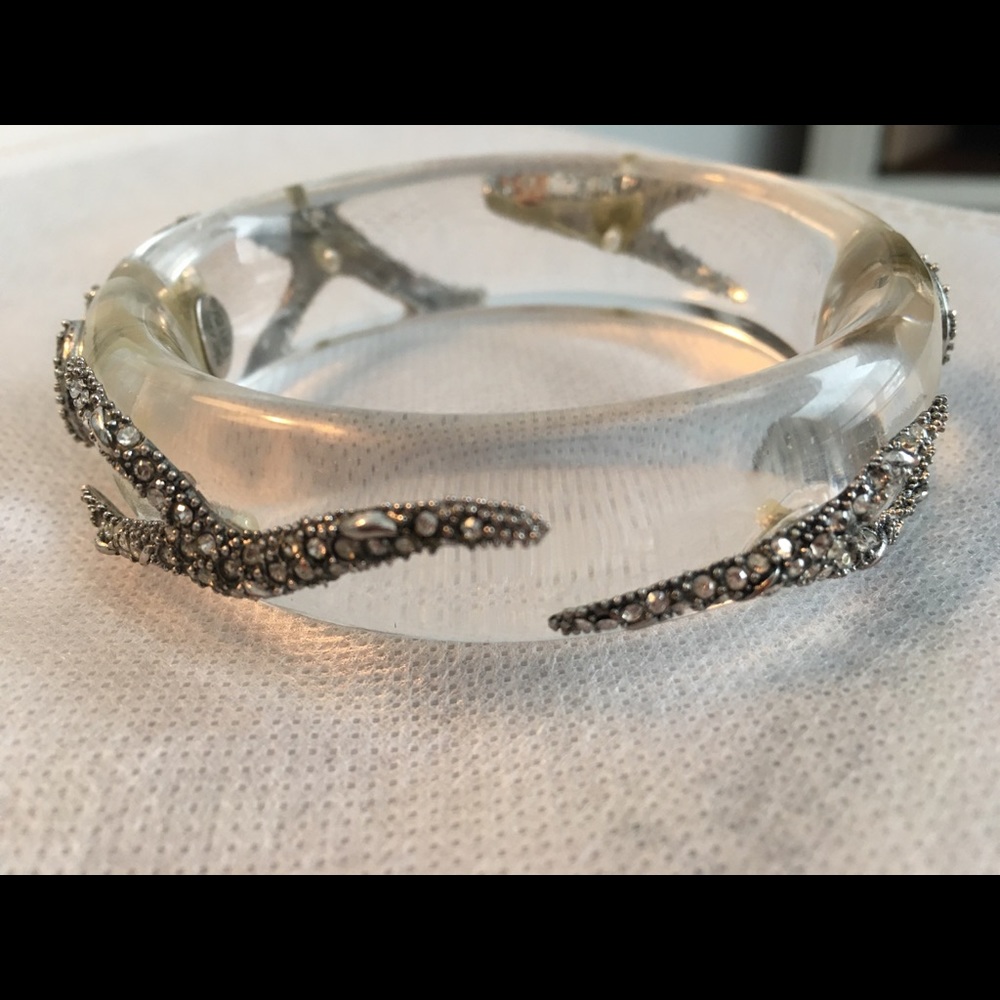 Alexis Bittar hinged bangle bracelet with silver and crystal detailing.